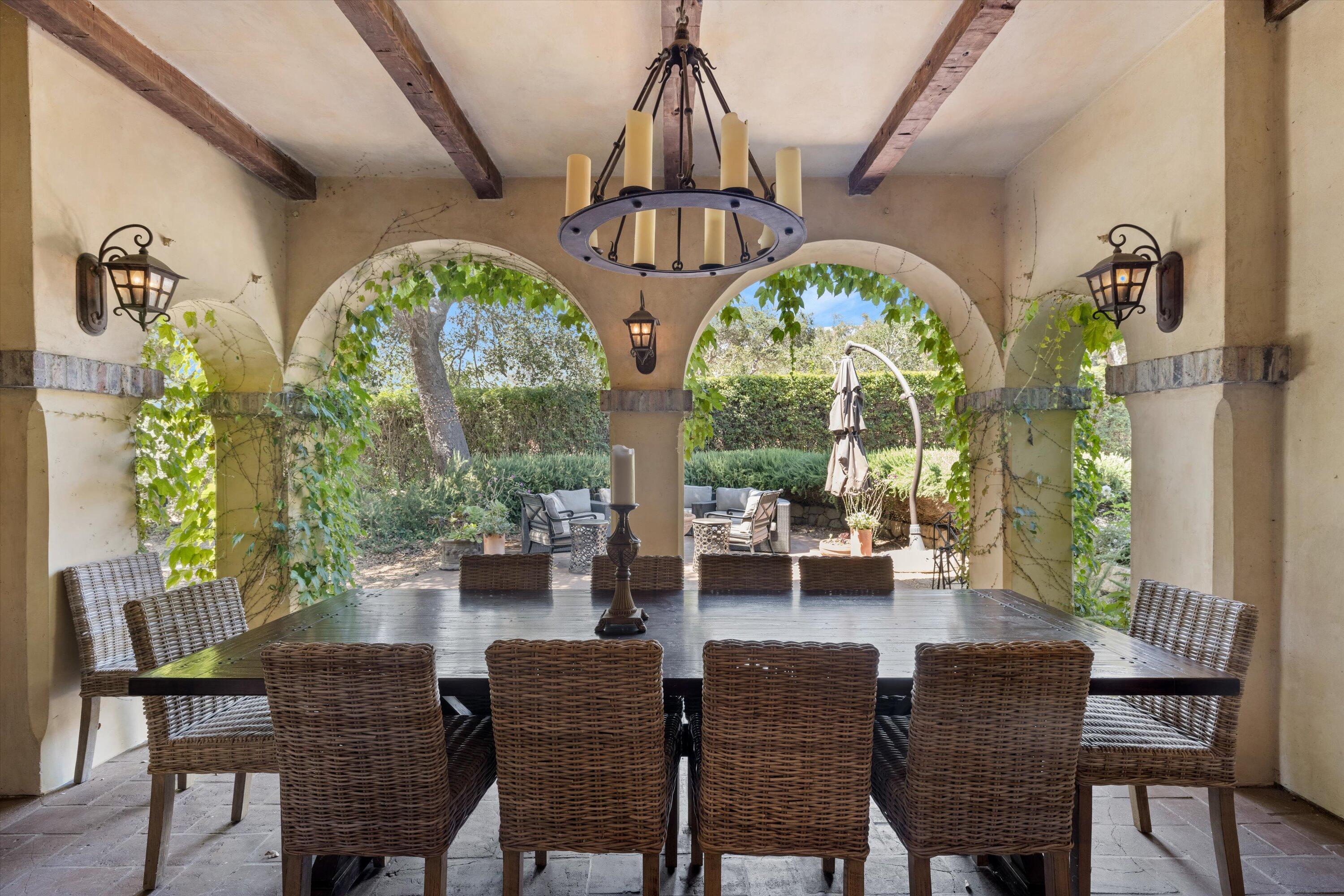 2222 East Valley Road Montecito, CA 93108 - Photo 12 of 30 a view of a dining room with furniture window and outside view