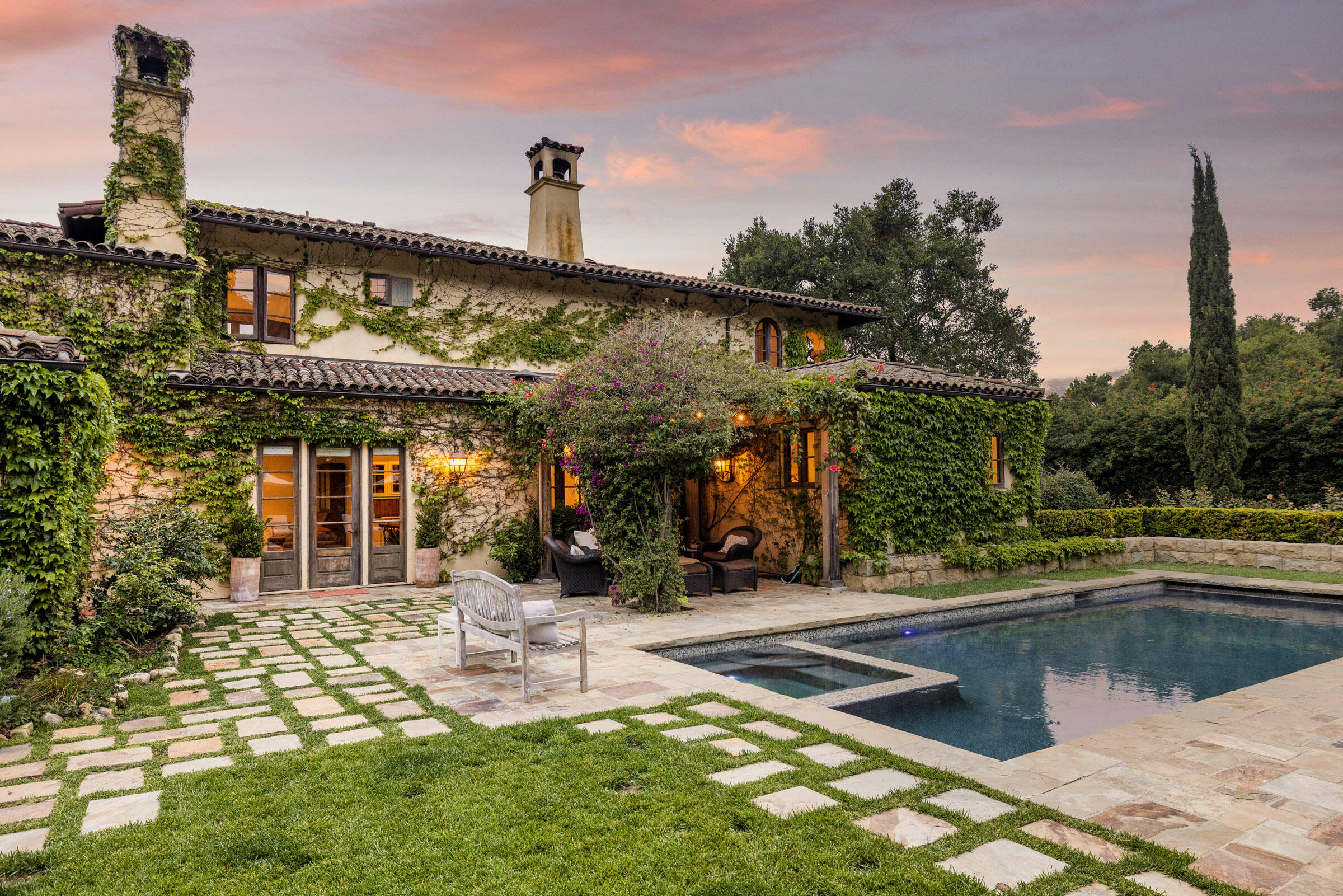2222 East Valley Road Montecito, CA 93108 - Photo 13 of 30 a view of a house with swimming pool and sitting area