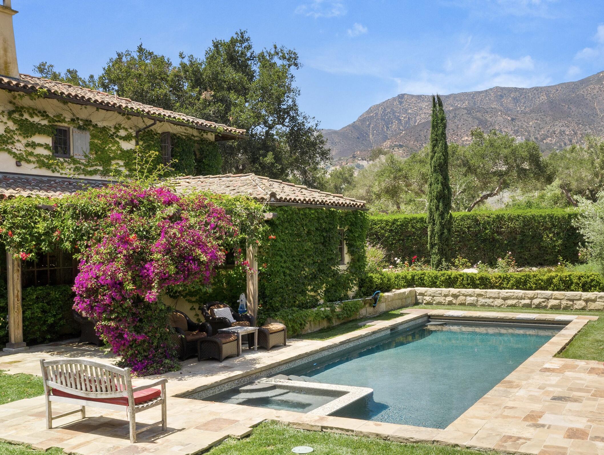 2222 East Valley Road Montecito, CA 93108 - Photo 2 of 30 a view of a swimming pool with a patio