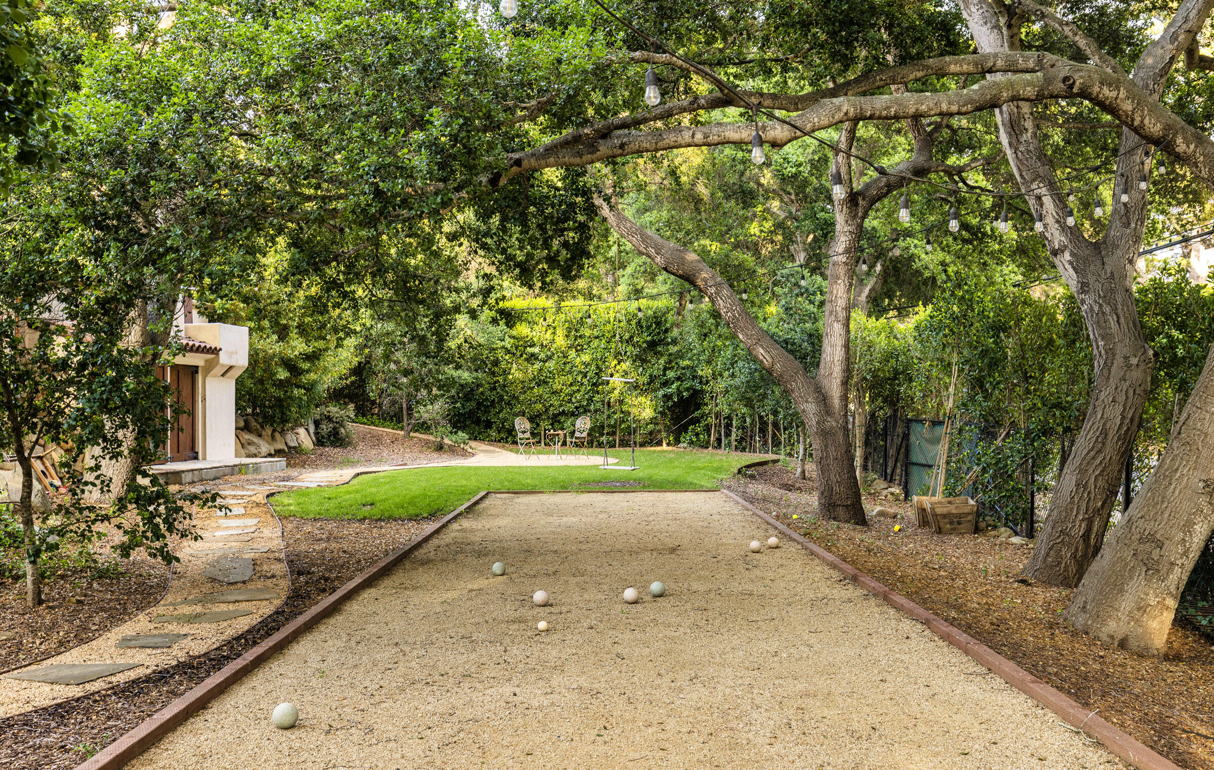 2222 East Valley Road Montecito, CA 93108 - Photo 26 of 30 a view of a backyard with large trees