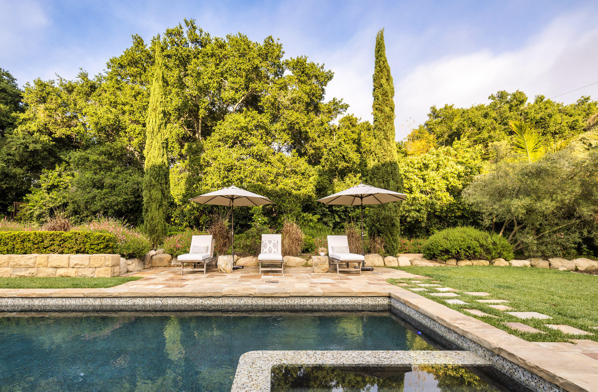 2222 East Valley Road Montecito, CA 93108 - Photo 28 of 30 a swimming pool with outdoor seating and yard