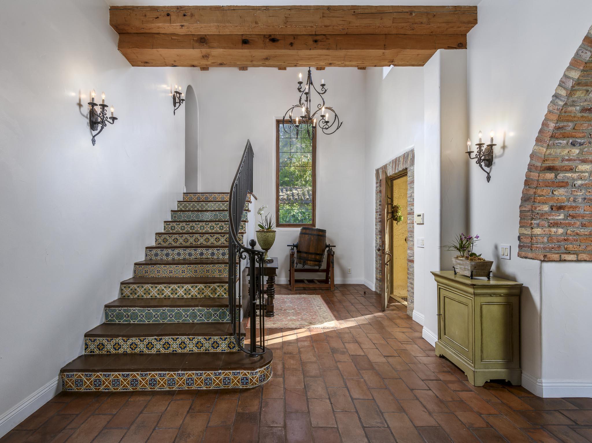 2222 East Valley Road Montecito, CA 93108 - Photo 7 of 30 a view of entryway with wooden floor and stairs