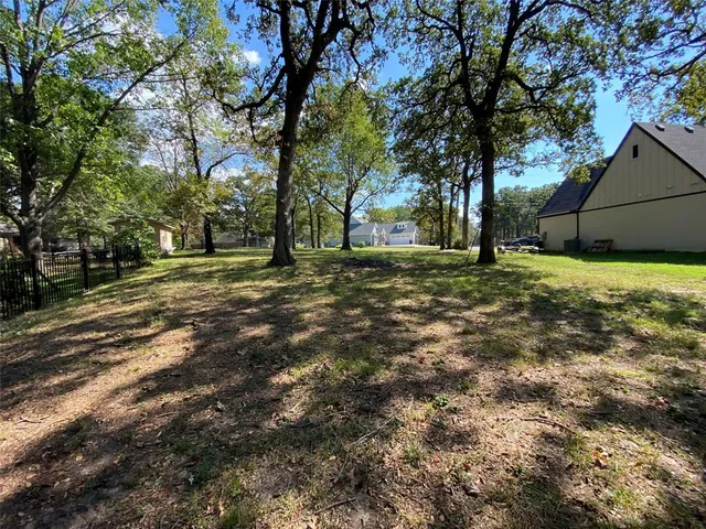 a big yard with trees