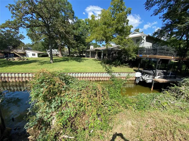 a view of a garden with houses