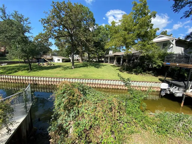 a view of a garden with houses