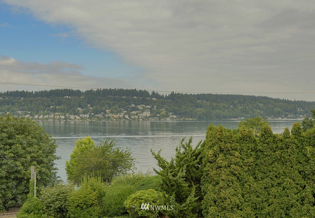 805 North 33rd Place Renton, WA 98056 - Photo 2 of 24 a view of lake with mountain