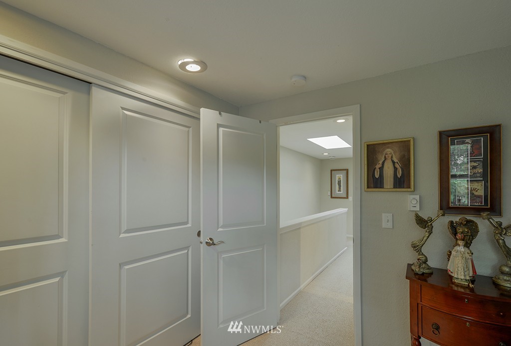 805 North 33rd Place Renton, WA 98056 - Photo 12 of 24 a view of a hallway with workspace