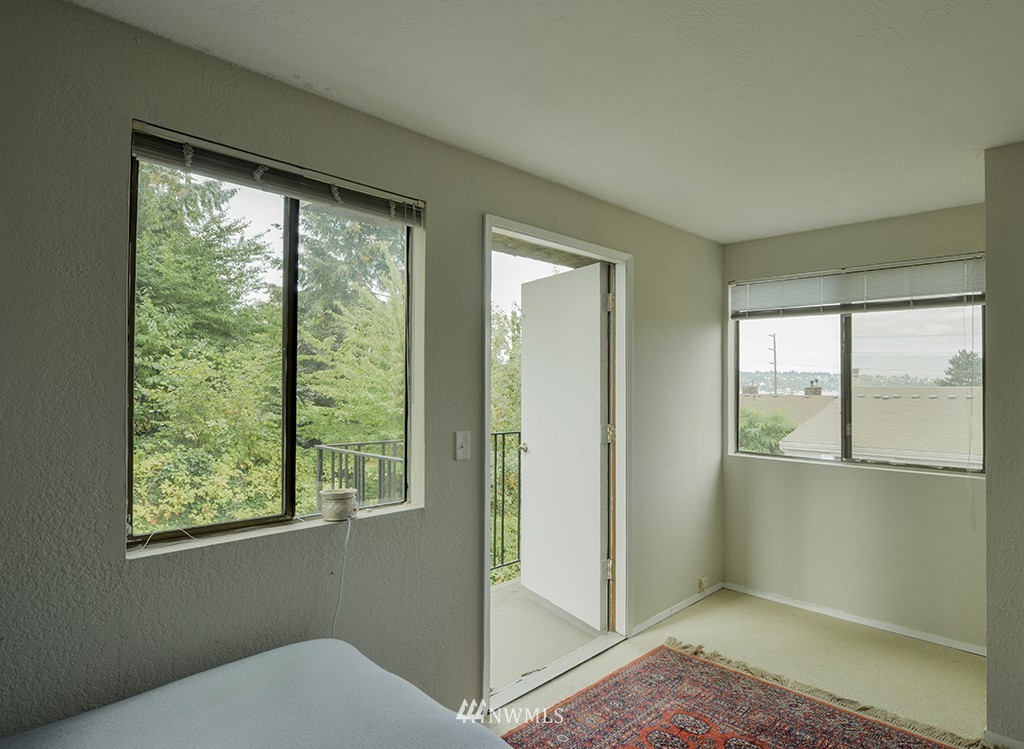 805 North 33rd Place Renton, WA 98056 - Photo 19 of 24 a view of an empty room with a window