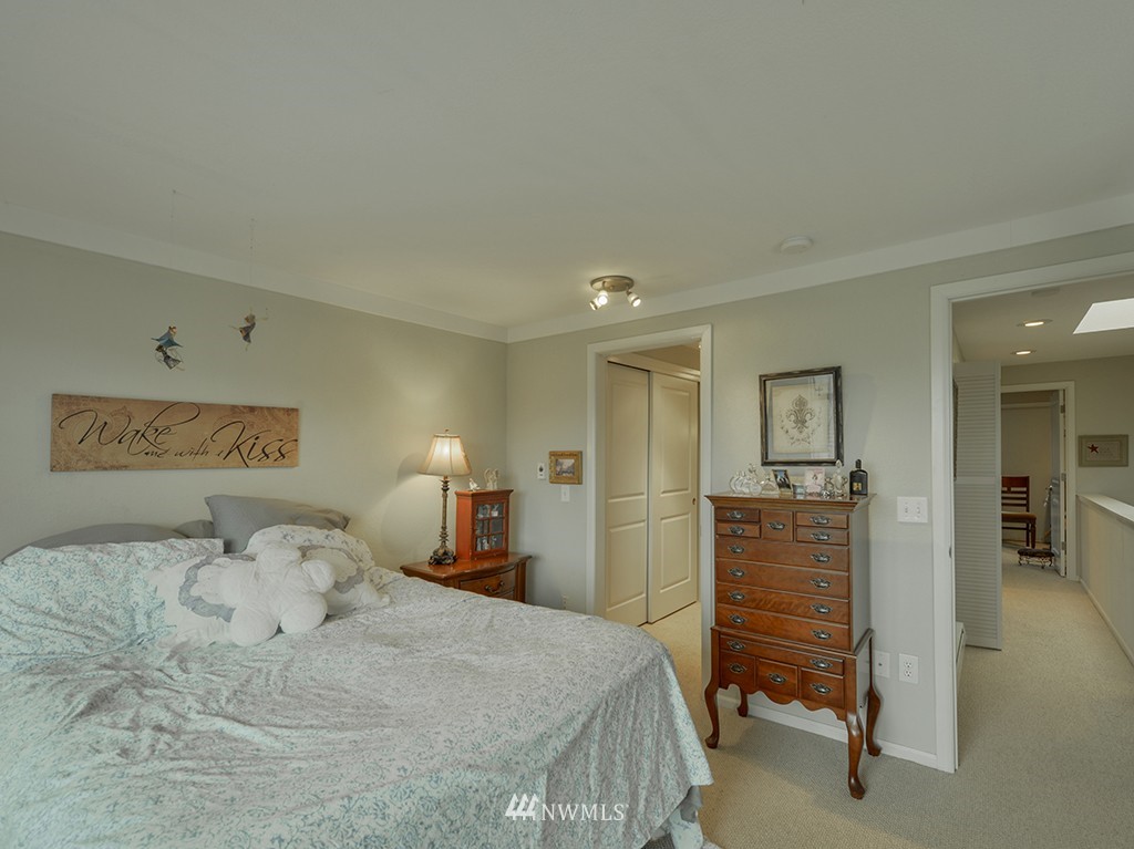 805 North 33rd Place Renton, WA 98056 - Photo 9 of 24 a bedroom with a bed and closet