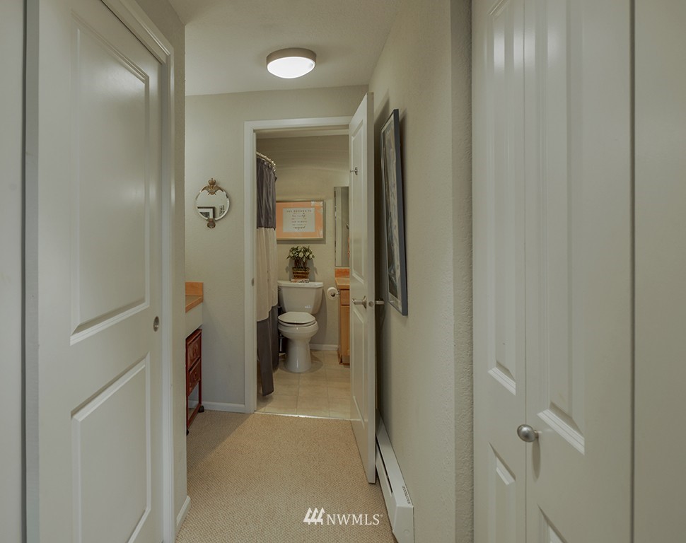 805 North 33rd Place Renton, WA 98056 - Photo 10 of 24 a view of a bathroom from a hallway