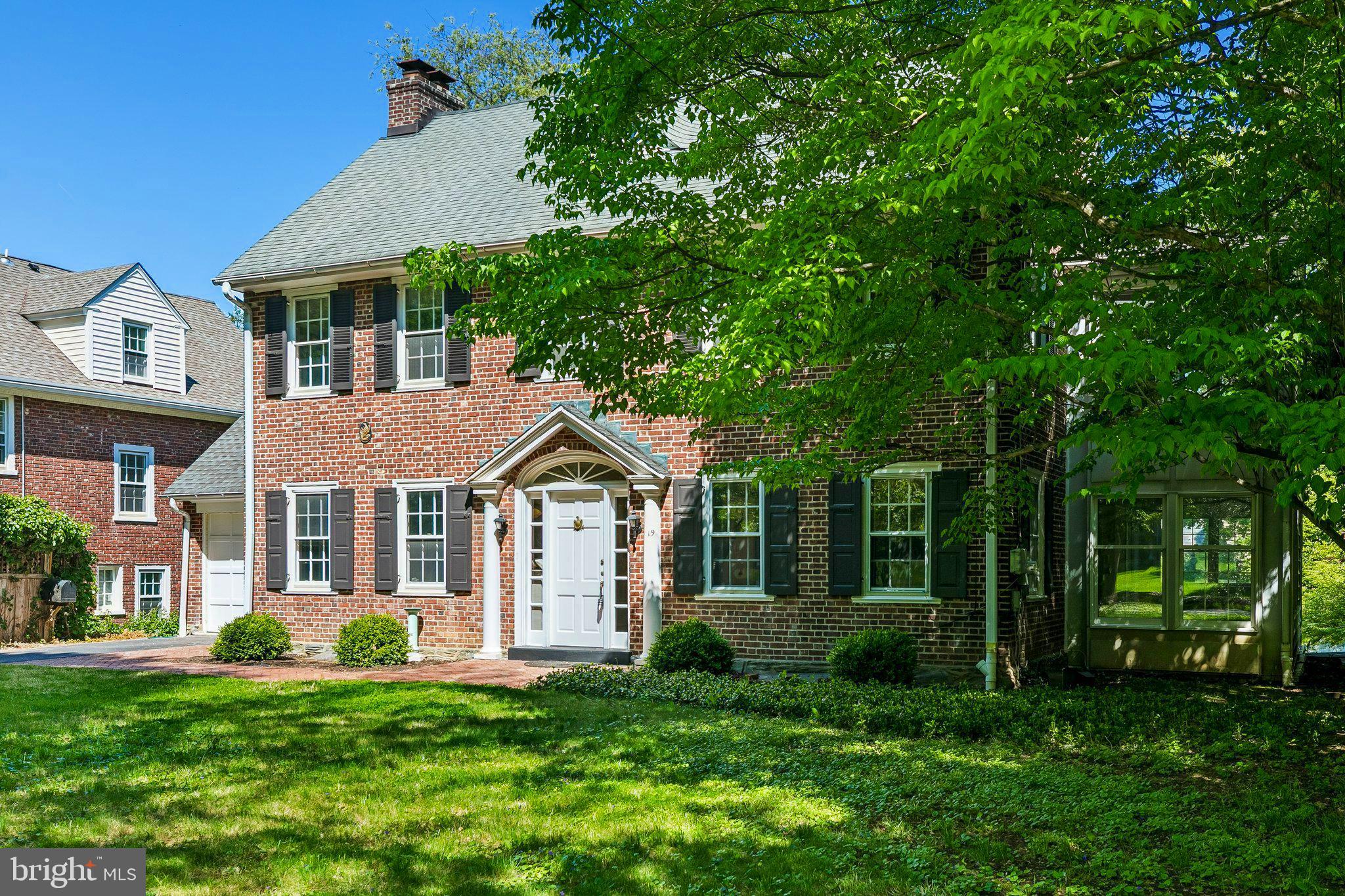 19 Farm Road Wayne, PA 19087 - Photo 2 of 50 a front view of a house with a yard