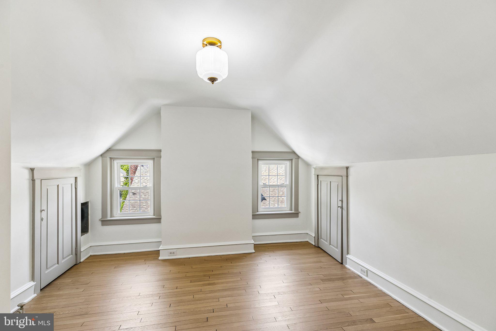 19 Farm Road Wayne, PA 19087 - Photo 40 of 50 a view of an empty room with window and wooden floor