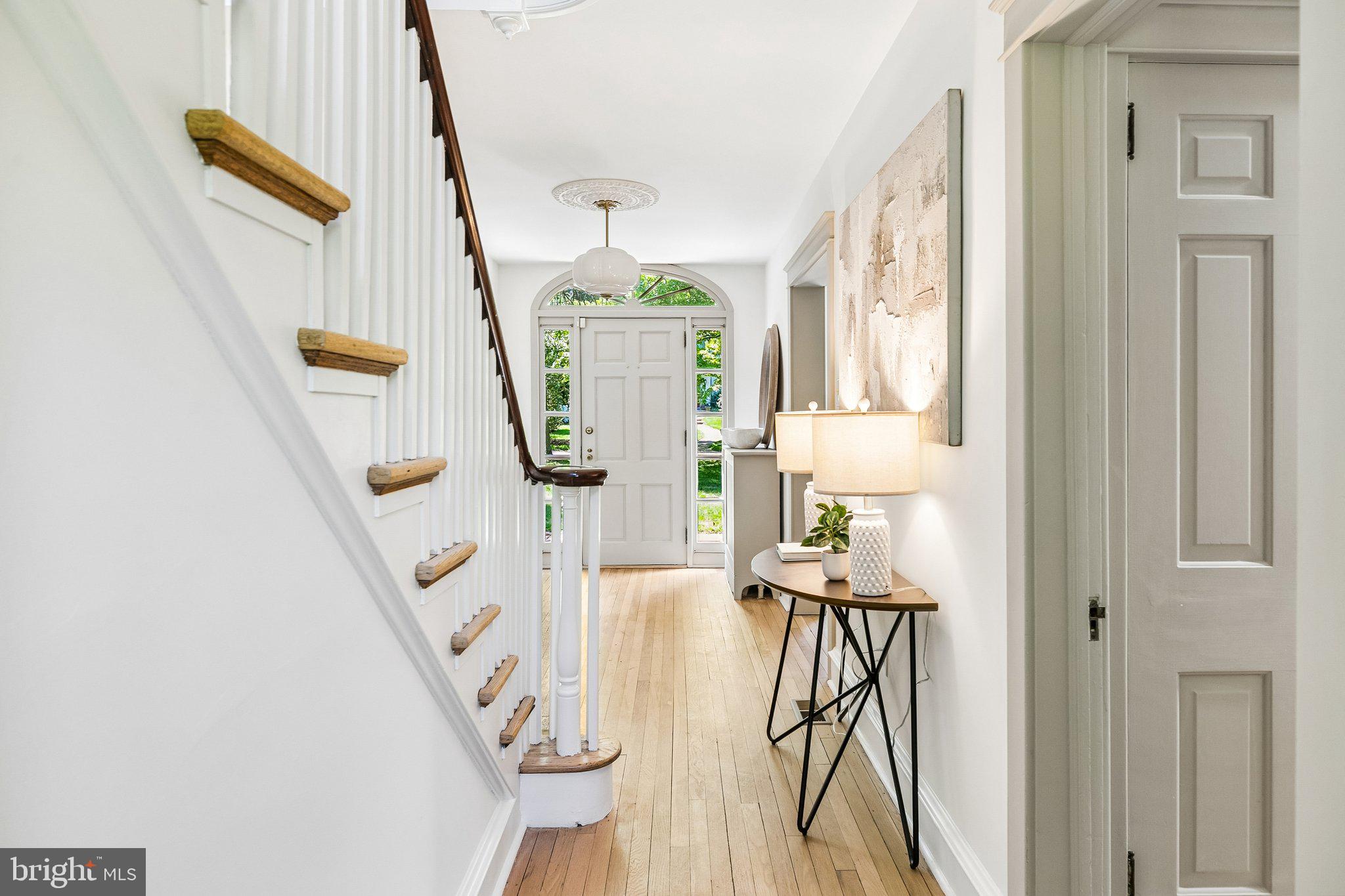 19 Farm Road Wayne, PA 19087 - Photo 4 of 50 a view of entryway and hall with wooden floor