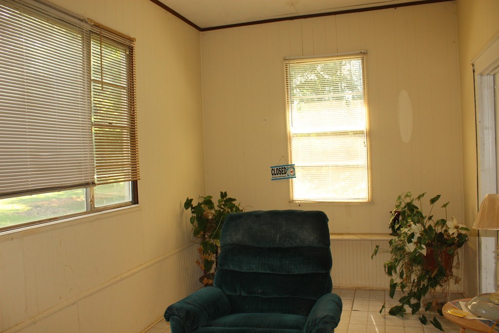 2081 Flint Road, Unit 2 Culloden, GA 31016 - Photo 2 of 7 a living room with furniture and a potted plant