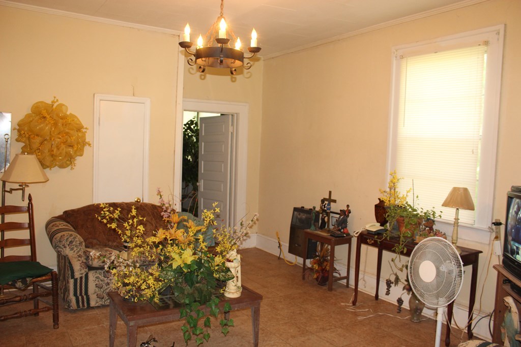 2081 Flint Road, Unit 2 Culloden, GA 31016 - Photo 3 of 7 a view of a dining room with furniture and wooden floor