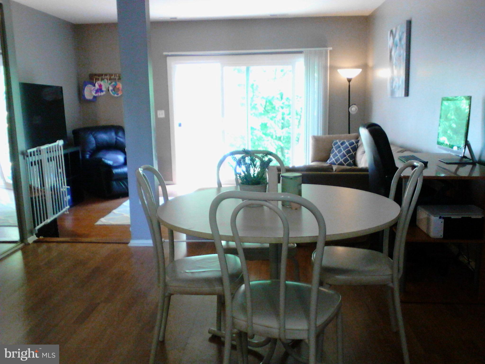 365 Capetowne Road Arnold, MD 21012 - Photo 5 of 20 DINING ROOM overlooking LIVING ROOM & BACKYARD