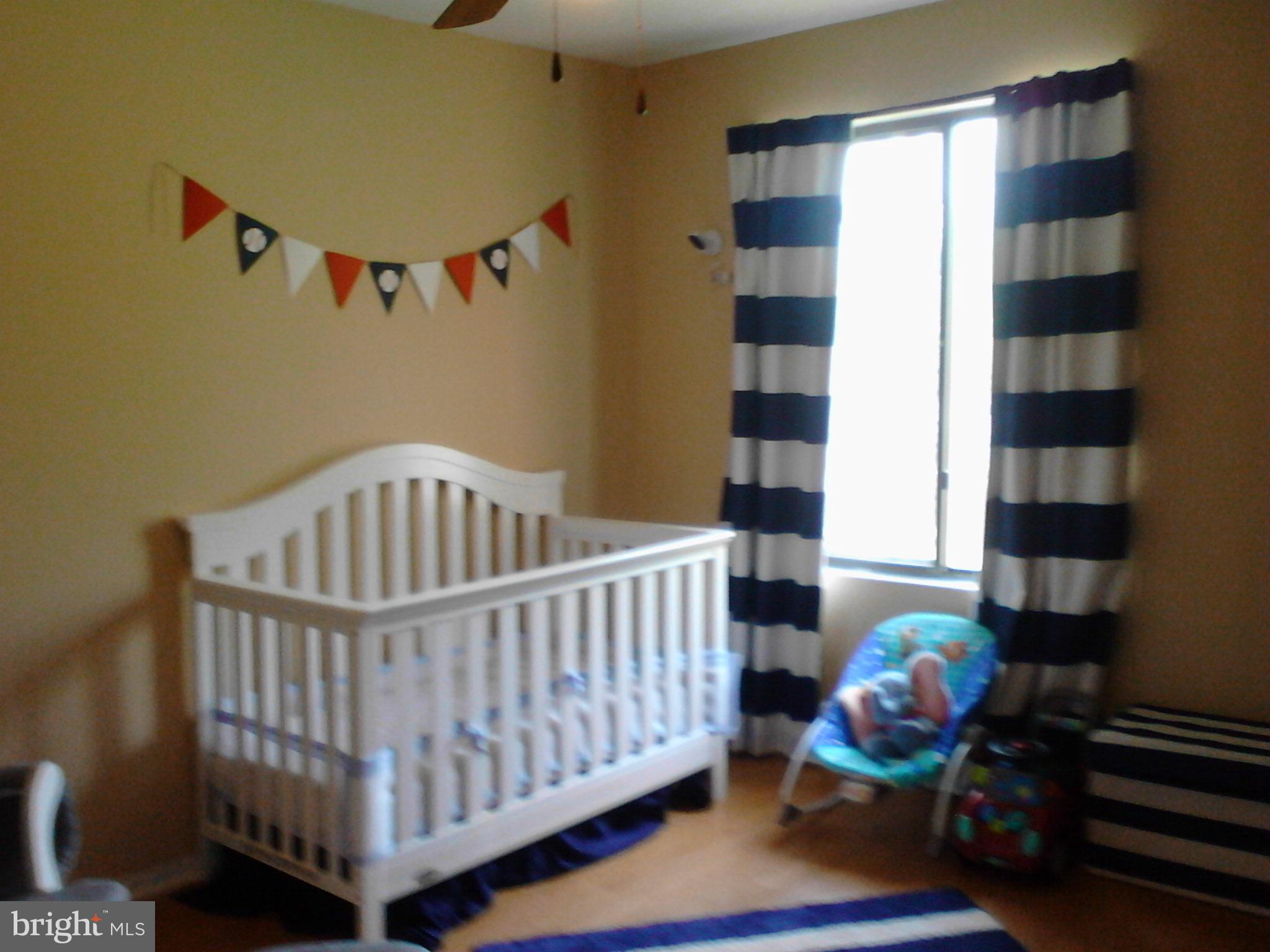 365 Capetowne Road Arnold, MD 21012 - Photo 10 of 20 SUNNY FRONT BEDROOM (12x12) - WOOD FLOORS