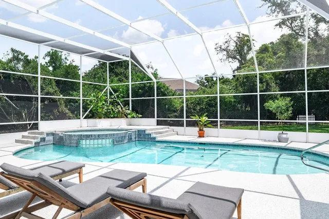 a view of a living room and dining room