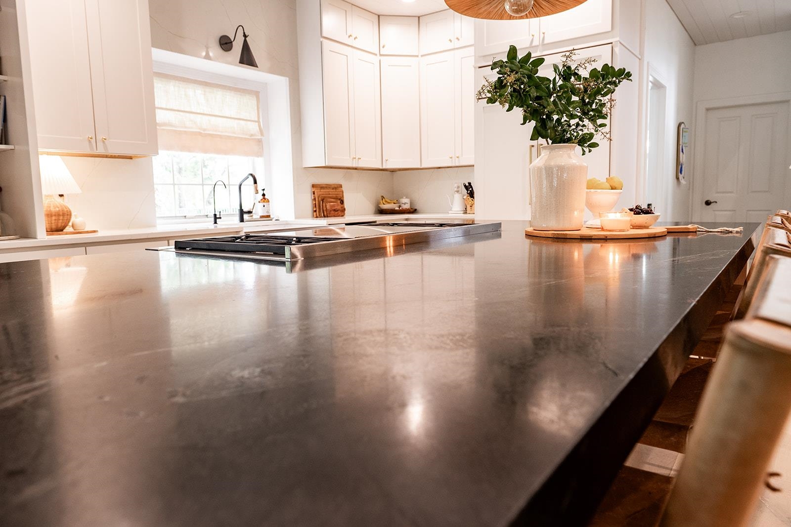 426 Marsh Point Circle St. Augustine, FL 32080 - Photo 29 of 87 a view of a kitchen with kitchen island a counter tops pace a sink and a window