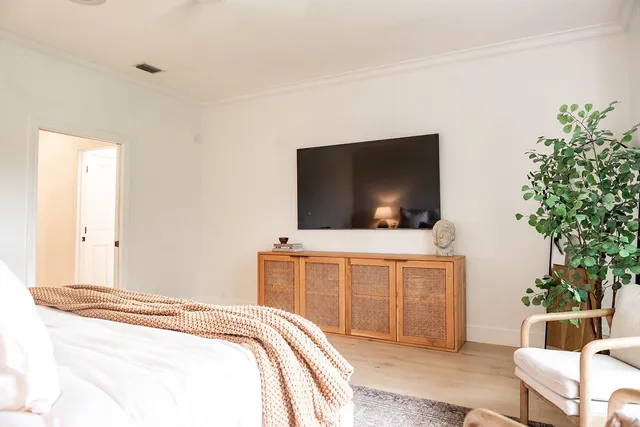 a view of a patio with a dining table and chairs