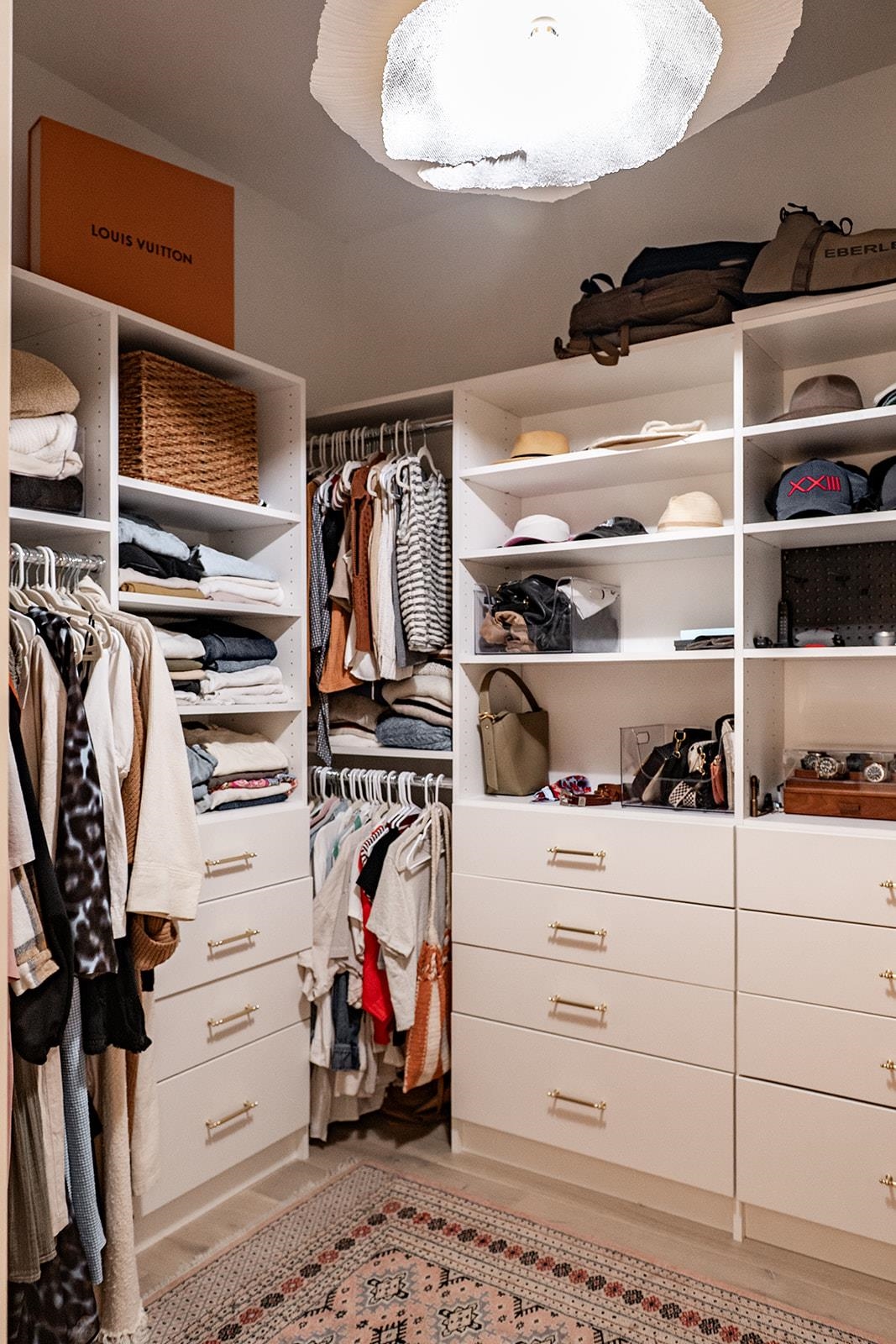 426 Marsh Point Circle St. Augustine, FL 32080 - Photo 51 of 87 a view of walk in closet with clothes and shoes