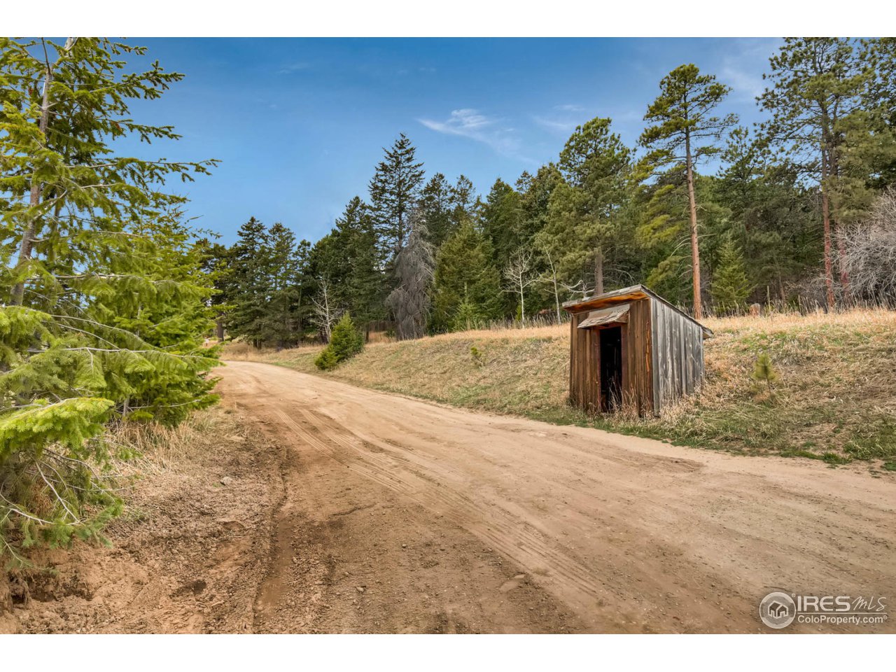 8537 Doubleheader Ranch Road Morrison, CO 80465 - Photo 2 of 40 a view of a outdoor space with a house