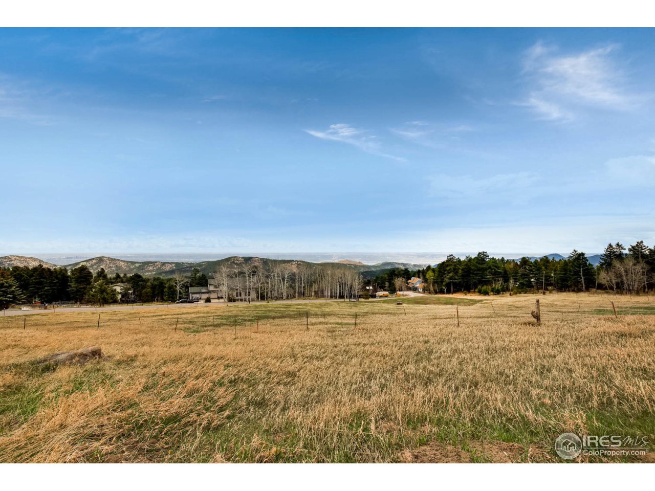 8537 Doubleheader Ranch Road Morrison, CO 80465 - Photo 27 of 40 a view of lake and mountain