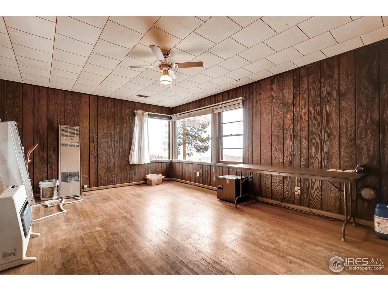 8537 Doubleheader Ranch Road Morrison, CO 80465 - Photo 36 of 40 a view of an empty room with a window