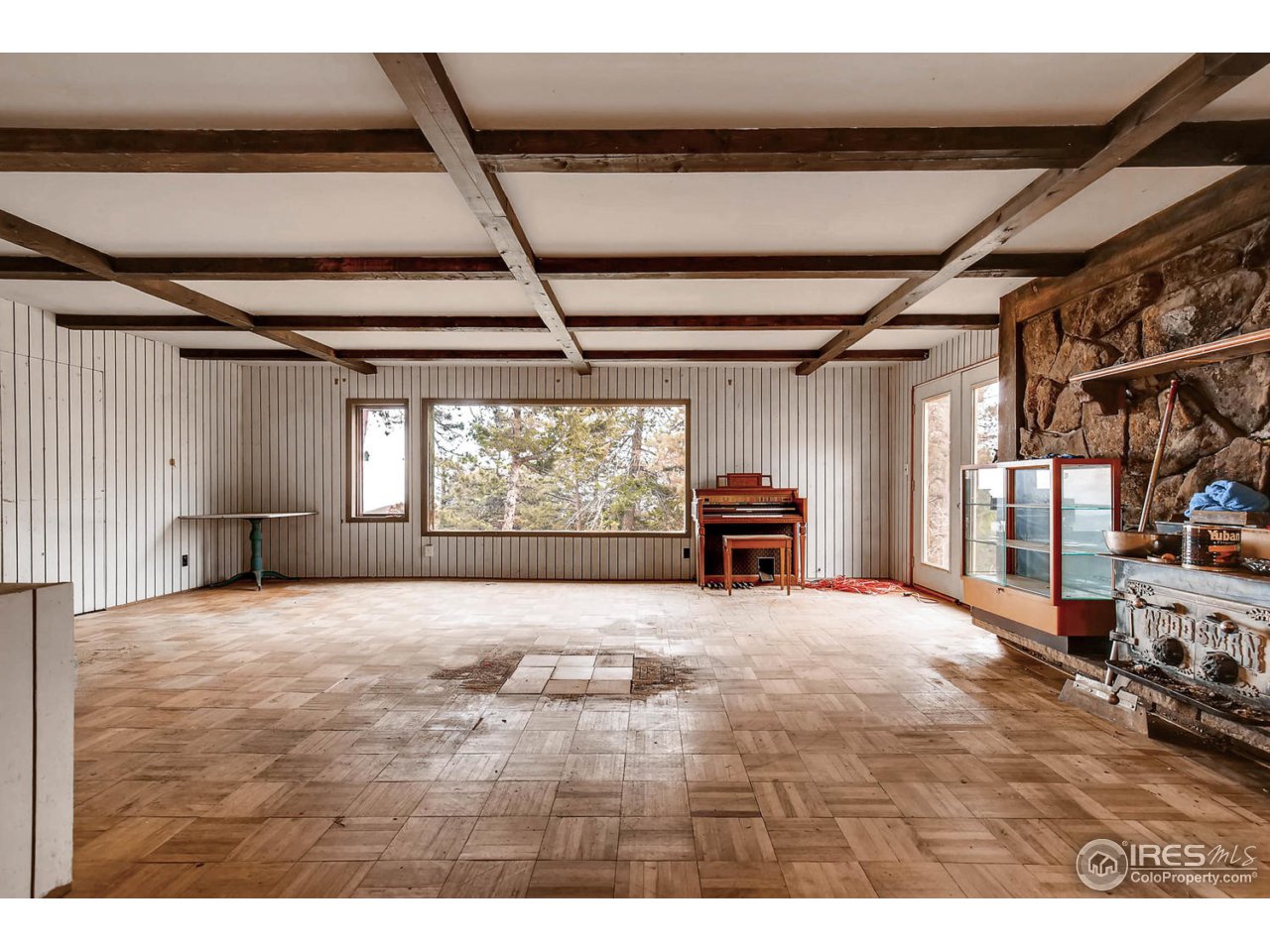8537 Doubleheader Ranch Road Morrison, CO 80465 - Photo 37 of 40 a view of an empty room with a window
