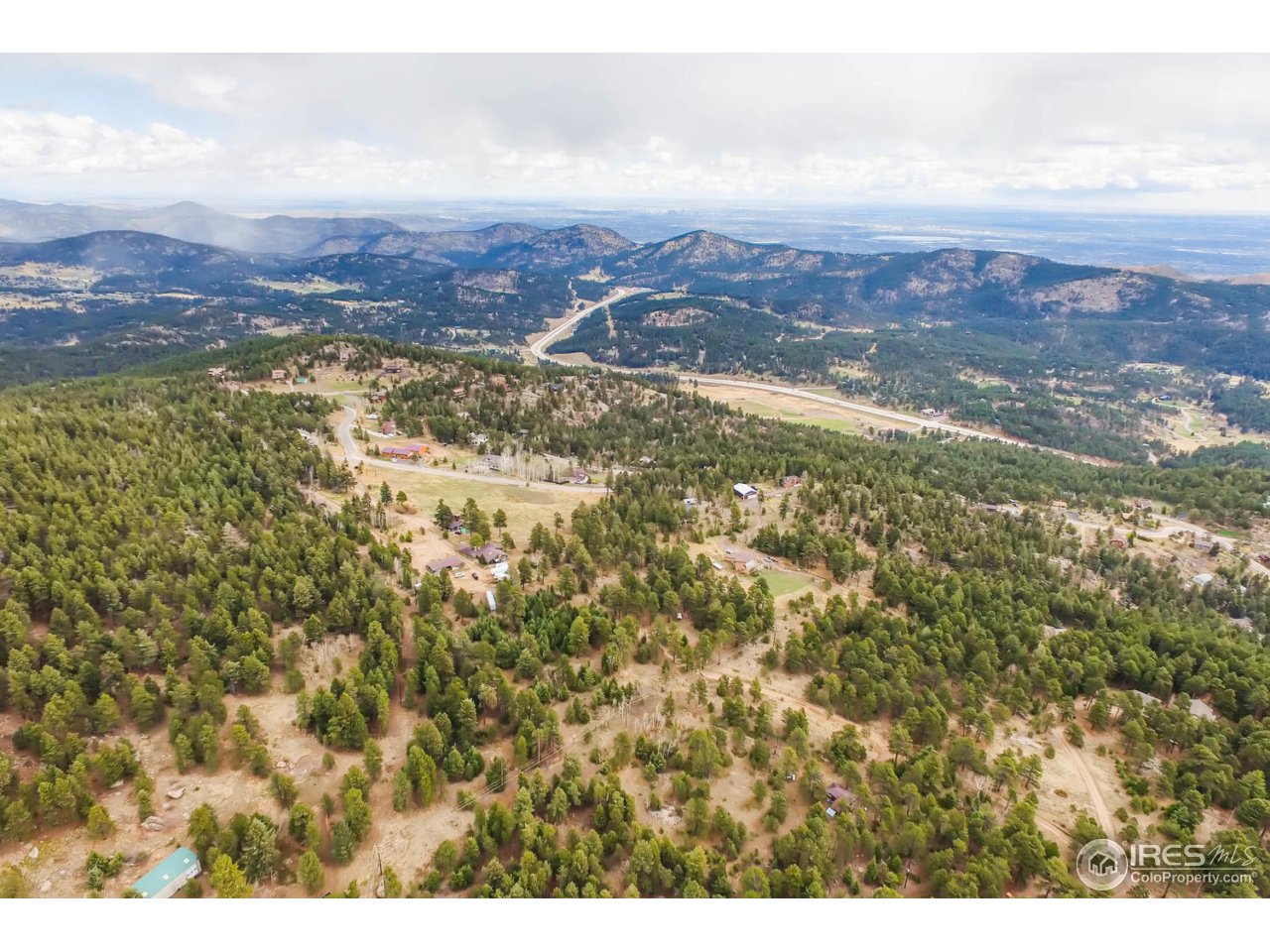8537 Doubleheader Ranch Road Morrison, CO 80465 - Photo 9 of 40 a view of city and mountain