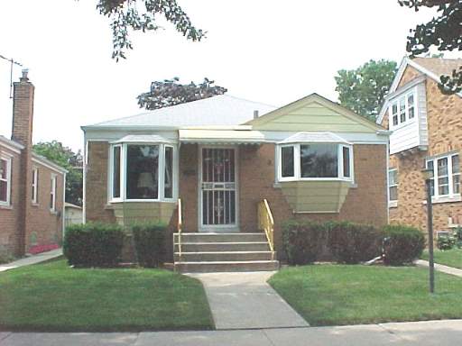 2550 Maple River Grove River Grove, IL 60171 - Photo 1 of 1 a front view of a house with garden