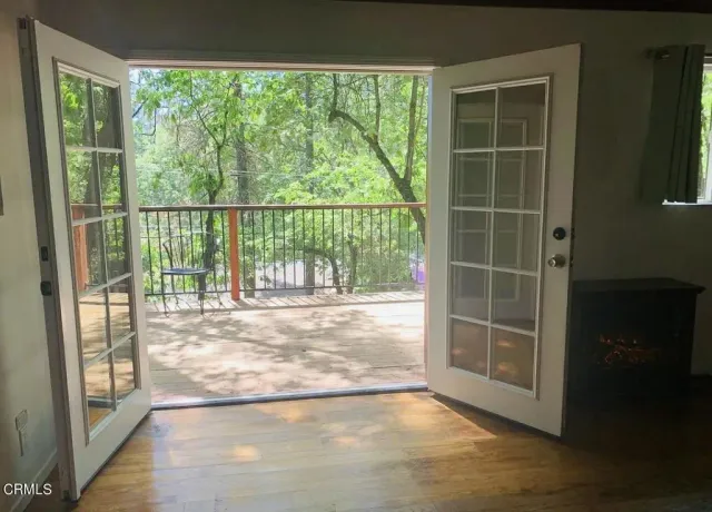 a view of empty room with windows