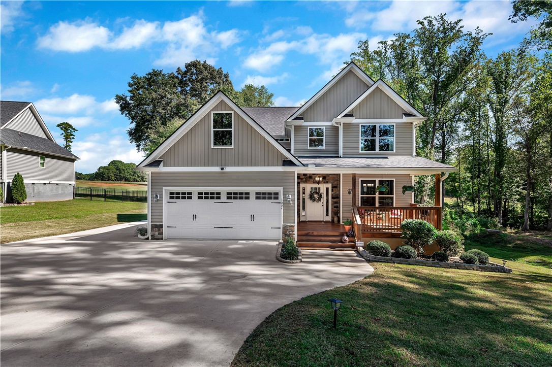 3004 Cobbs Way Anderson, SC 29621 - Photo 1 of 46 A spacious driveway leads to this modern two-story home featuring a generous two-car garage.