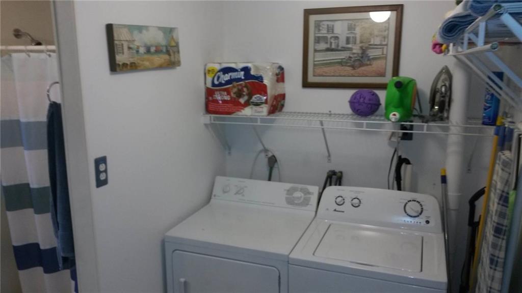 24 South Road South China, ME 04358 - Photo 11 of 27 1ST FLOOR LAUNDRY BETWEEN BATH AND...
