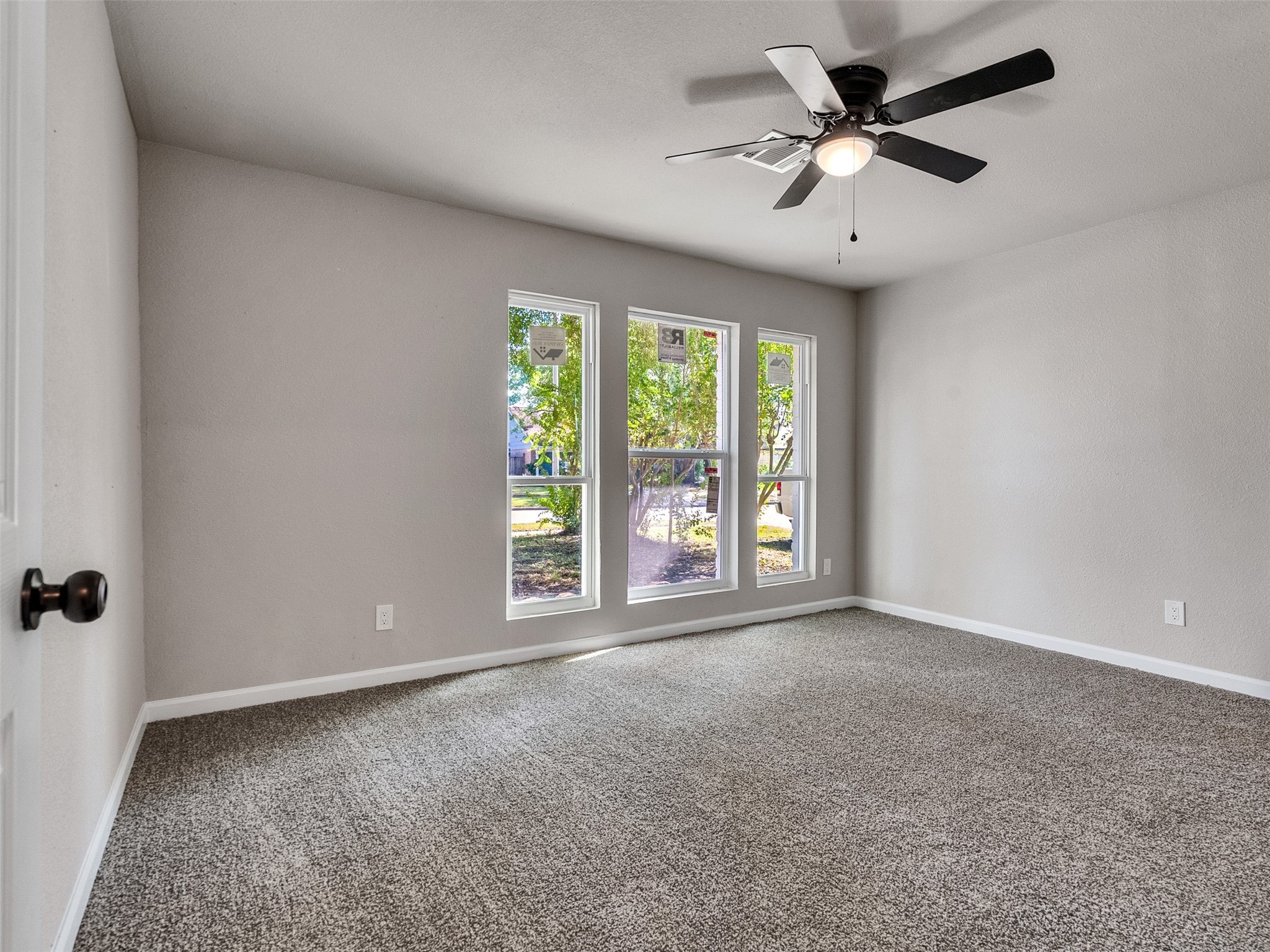 15123 Kaler Road Houston, TX 77060 - Photo 13 of 19 a view of an empty room with a window