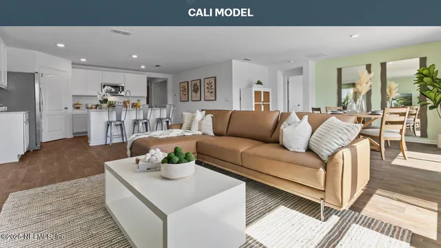 a living room with furniture and a table