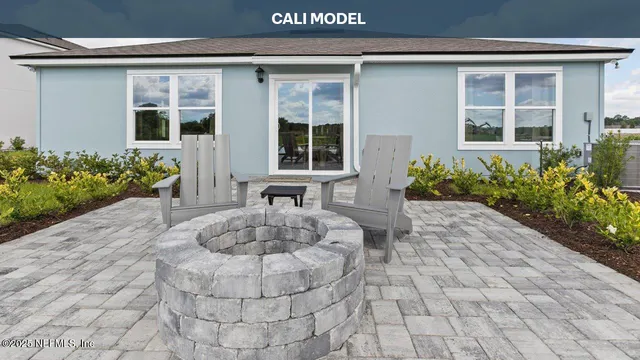 a view of a house with sitting area