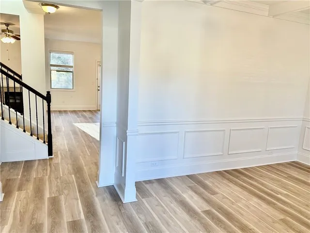 a kitchen with stainless steel appliances granite countertop a sink and a stove top oven
