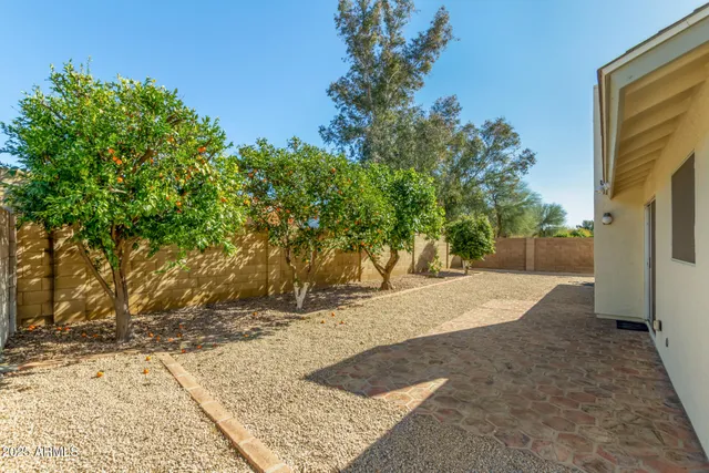 a view of backyard with green space