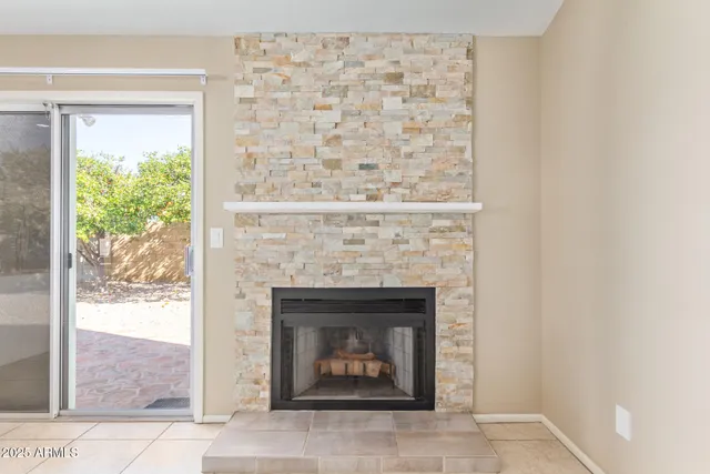 a living room with a fireplace