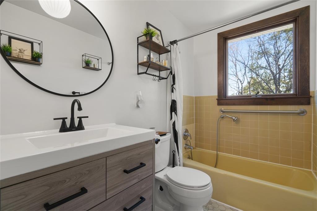 170 Ralston Road Sarver, PA 16055 - Photo 18 of 28 a bathroom with a sink a mirror a toilet and a shower