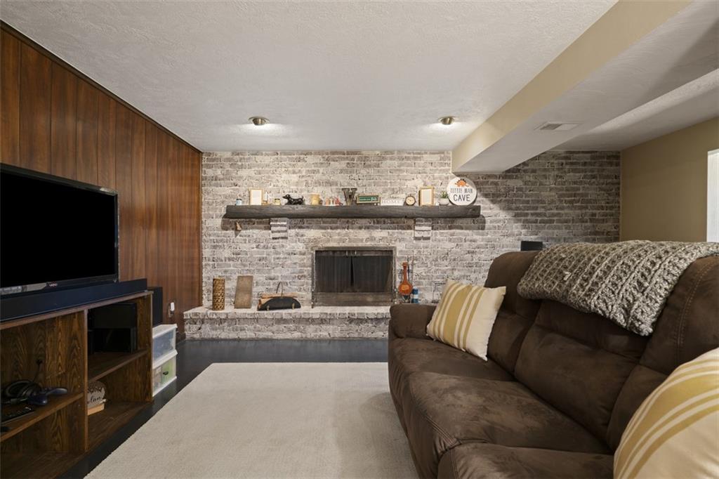 170 Ralston Road Sarver, PA 16055 - Photo 20 of 28 a living room with furniture and a flat screen tv