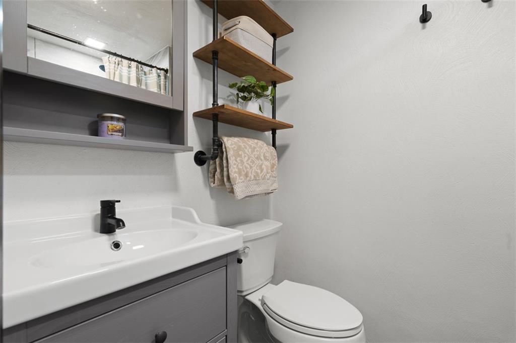 170 Ralston Road Sarver, PA 16055 - Photo 22 of 28 a bathroom with a sink a toilet and shower