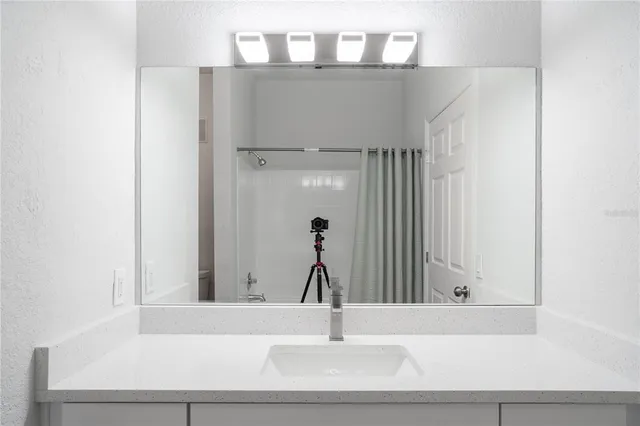 an empty room with wooden floor