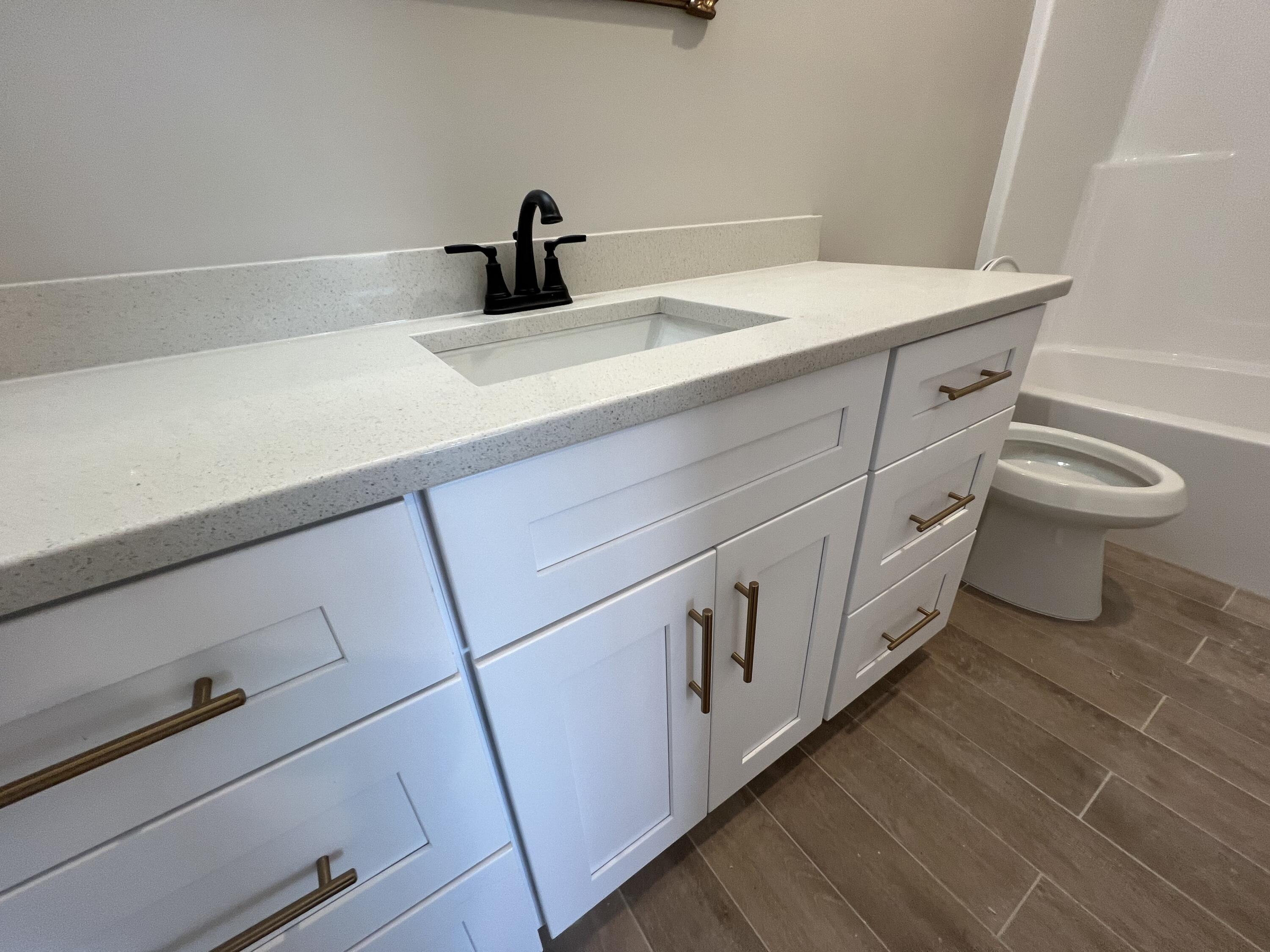 2747 Storm Branch Road Beech Island, SC 29842 - Photo 33 of 38 a bathroom with a sink and a toilet