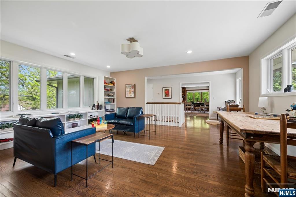 39 Eagle Nest Road Morris Township, NJ 07960 - Photo 27 of 43 a living room with furniture and a wooden floor