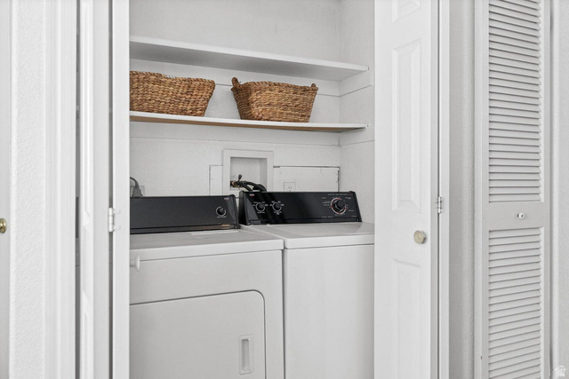 2990 East Riverside Drive, Unit 173 St. George, UT 84790 - Photo 14 of 38 Dedicated laundry closet with white panel doors and louvered bifold doors