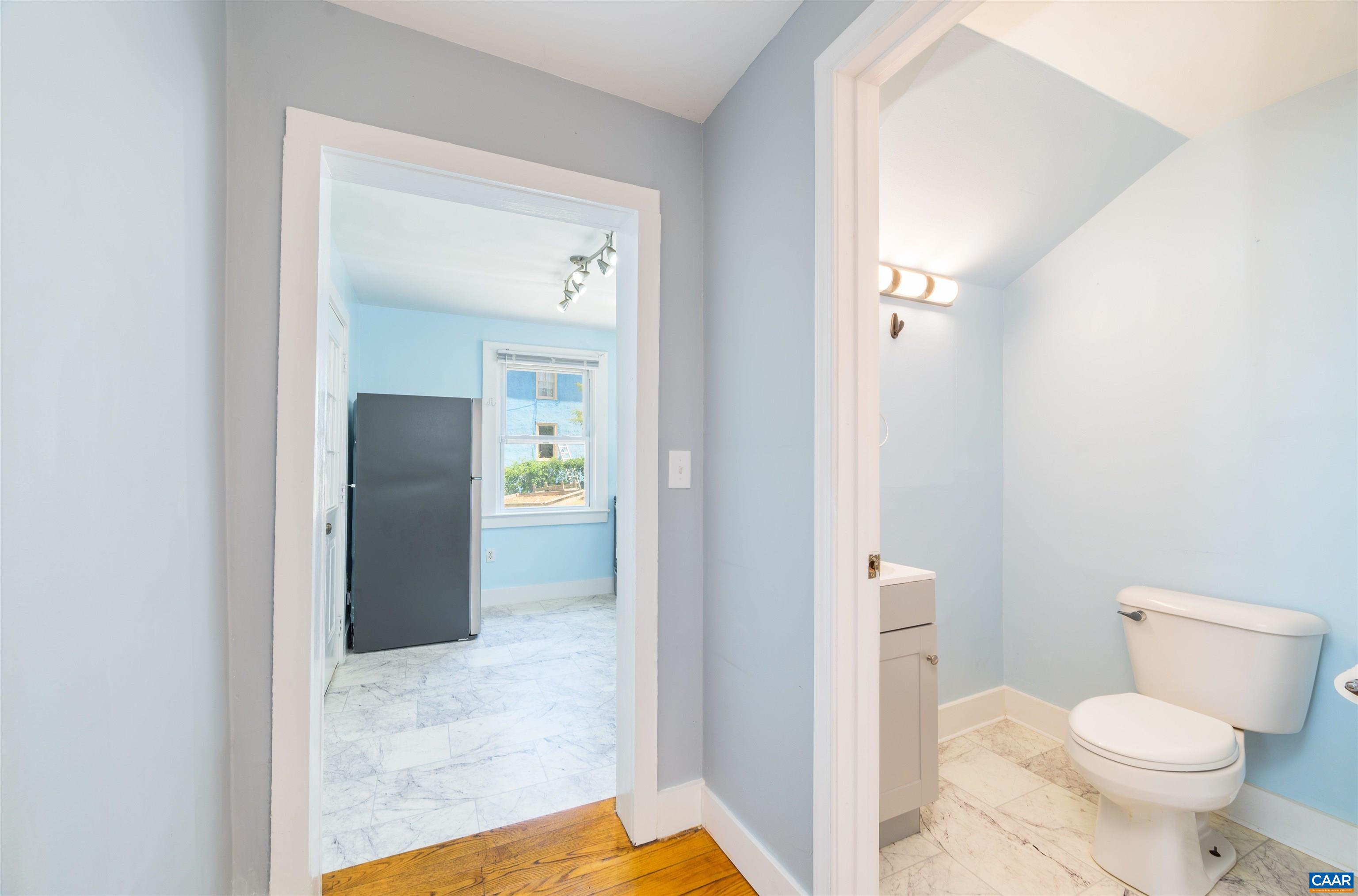 878 Ridge Street Charlottesville, VA 22902 - Photo 19 of 40 a bathroom with a toilet and a shower
