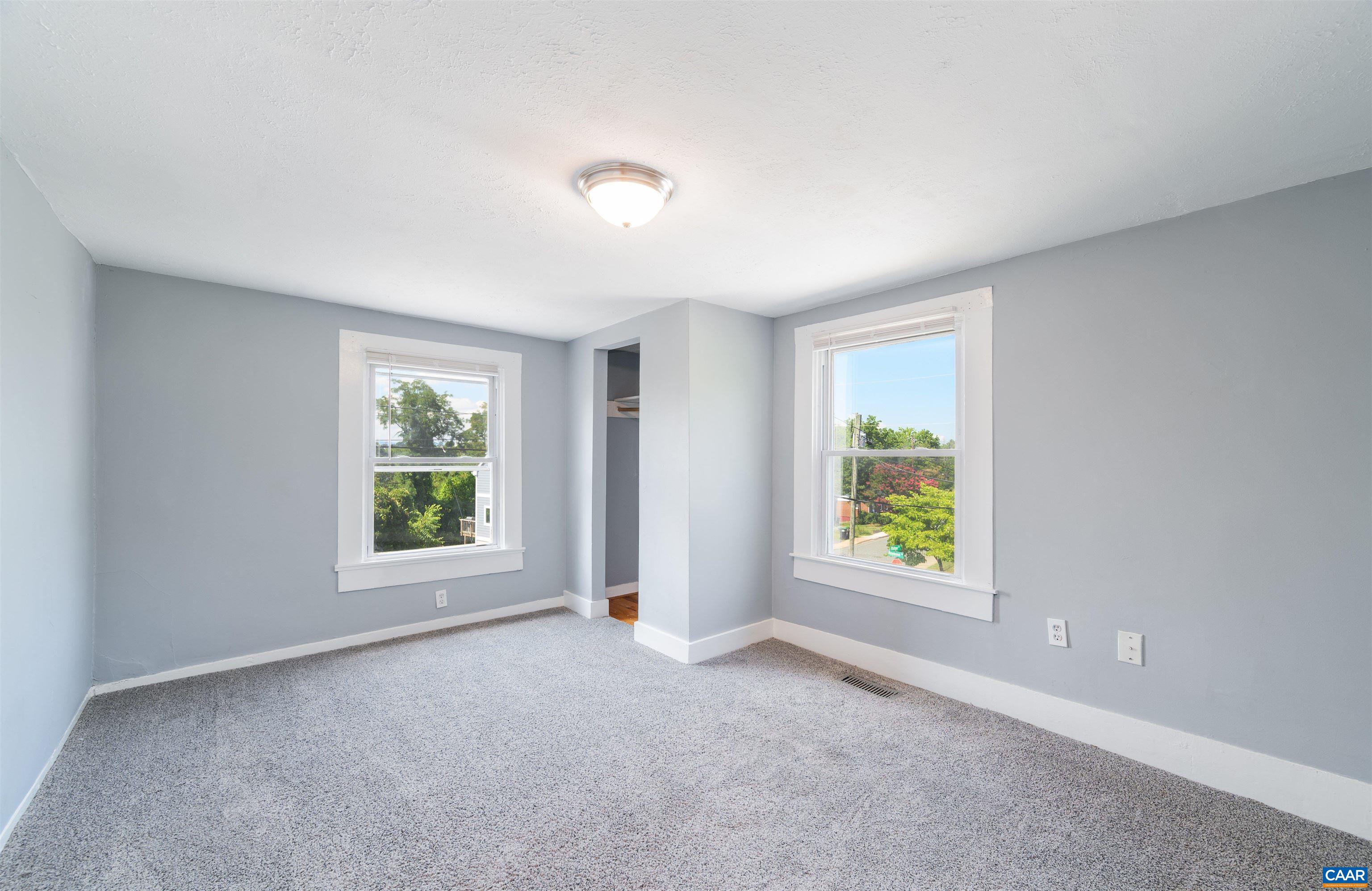 878 Ridge Street Charlottesville, VA 22902 - Photo 31 of 40 an empty room with windows