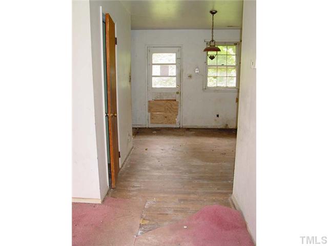 913 Newcombe Road Raleigh, NC 27610 - Photo 3 of 5 a view of a hallway with windows